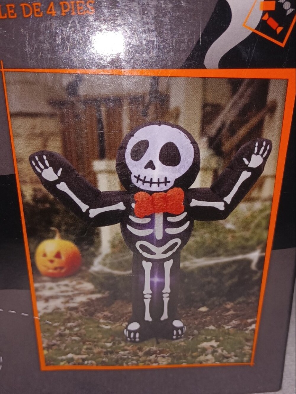 Huntington Home Black & White Inflatable Skeleton with Orange Bow